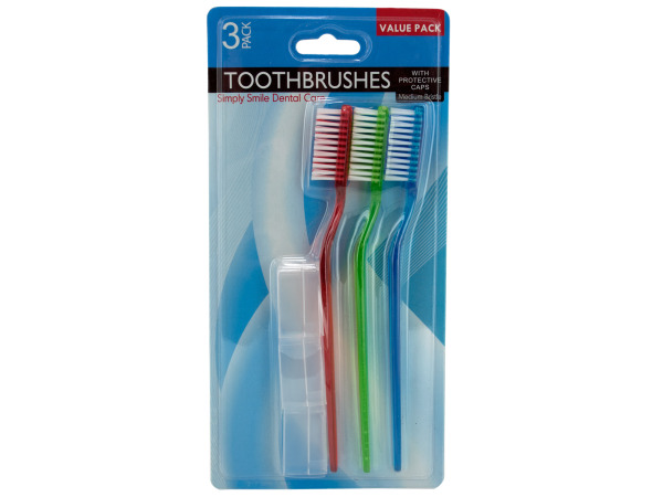 Medium bristle toothbrush with protective caps